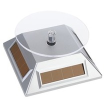 Solar rotating display table