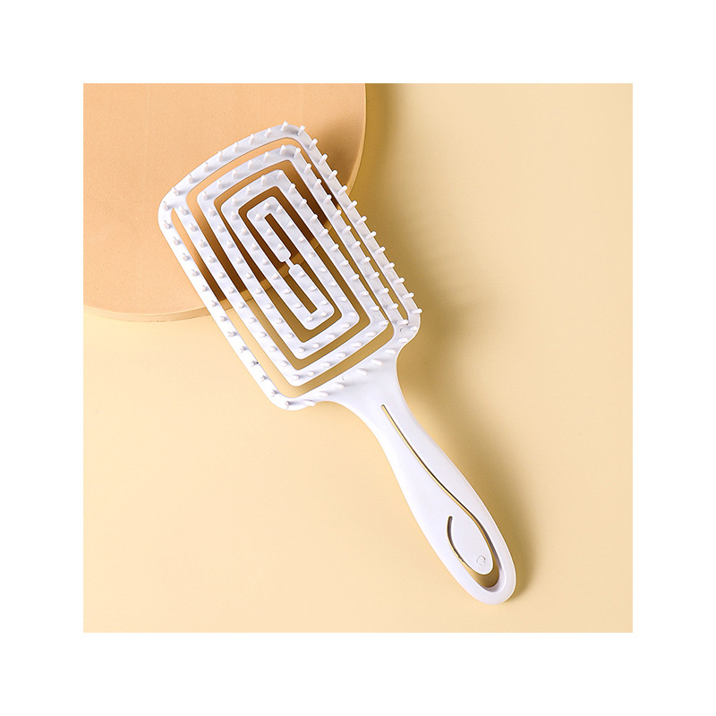 方形回形梳镂白底实物图