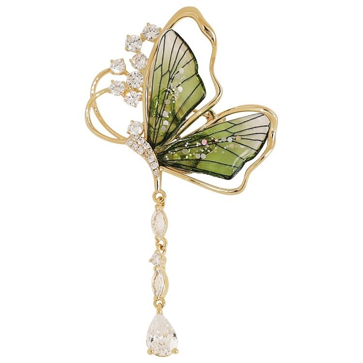 A High-End Emerald Brooch In 