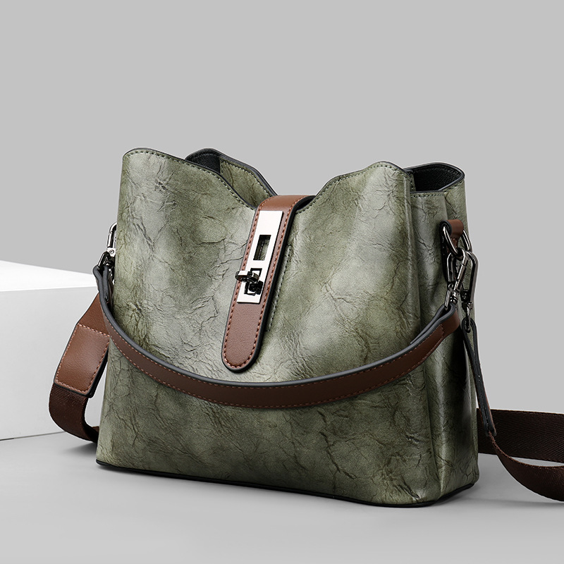 时尚女包跨境女包2025新款斜挎包时尚中年妈妈包小众潮手提单肩水桶包批发细节图