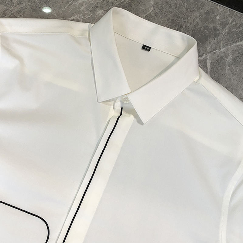 A new European-style simple and elegant solid-color shirt for men's spring and summer, featuring geometric pattern embroidery and a fitted business long-sleeved shirt Specification image