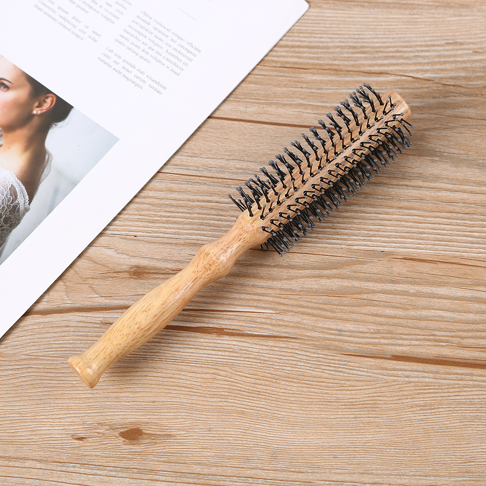 Factory direct sales of curly hair combs, wooden color, inner buckle design, round anti-static wooden comb Specification image