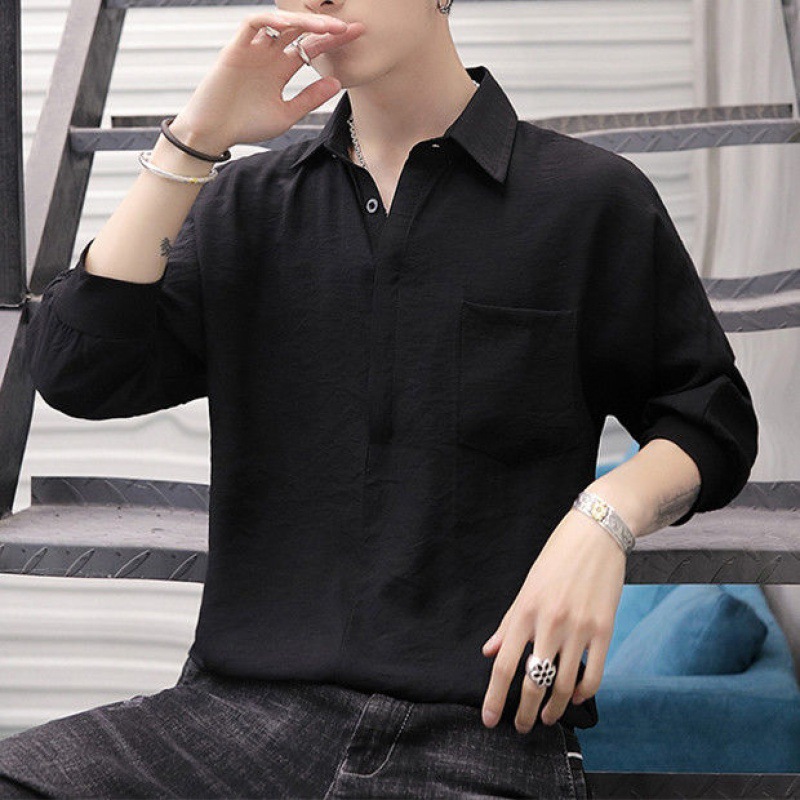 A new Korean-style, trendy and stylish men's shirt with a seven-quarter sleeve. It's a Japanese-style solid seven-quarter sleeve shirt for trendy men details Picture