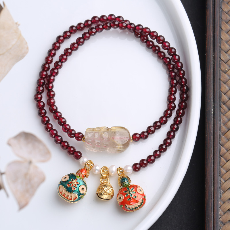 Wholesale of natural purple-toothed garnet, double-layer purple-toothed garnet, golden hair crystal, PI Xiu, and gold-swallowing beast ornaments