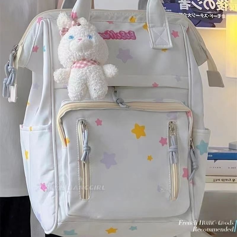 A Japanese-style inS-style schoolbag for a junior high school girl with a high level of appearance, a simple backpack for a trip, and a Korean-style hand-held backpack