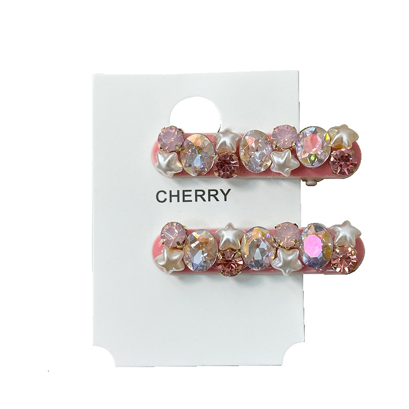 Multiple views of the Pink Flash Diamond Zircon Hairpin