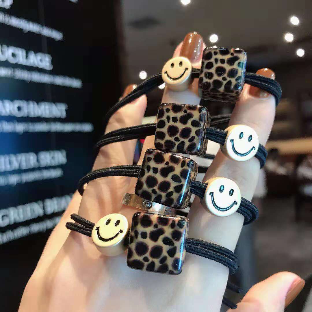 Leopard print hair tie, square smiley face leather band and leather cover, Korean style hair band, high elasticity hair tie, two-yuan store hair accessory Application Scenario