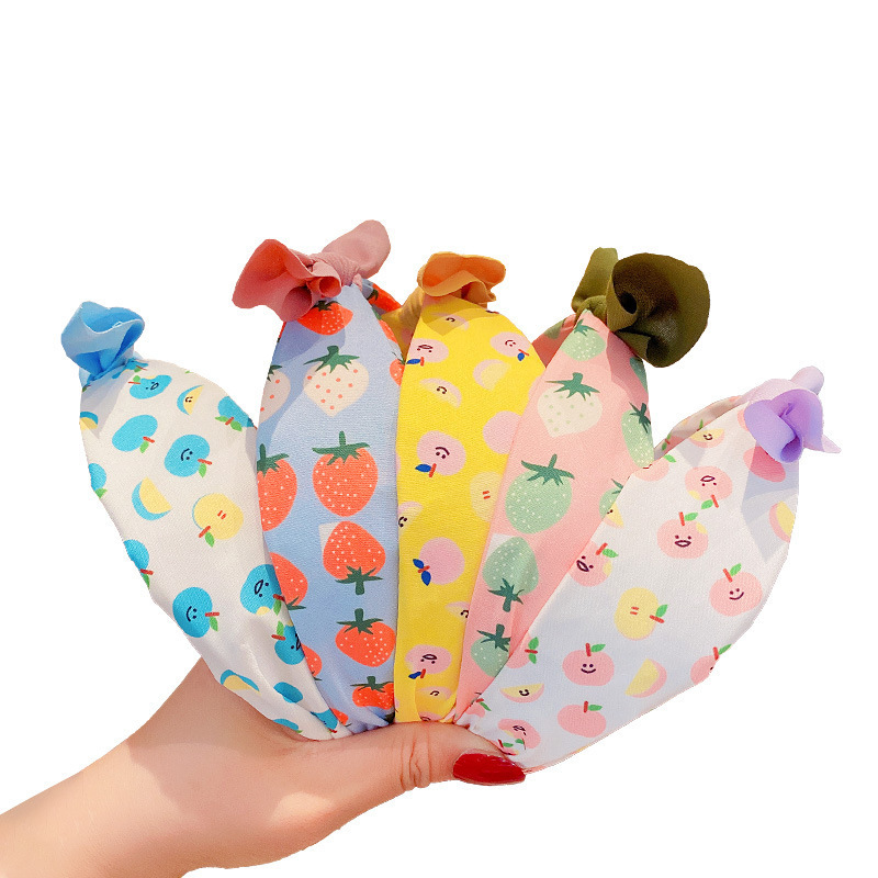 Wholesale of Korean-style children's fruit hair bands that do not damage the headband, wide-edge fabric hair clips, girls' bow hair compression headwear Item Picture