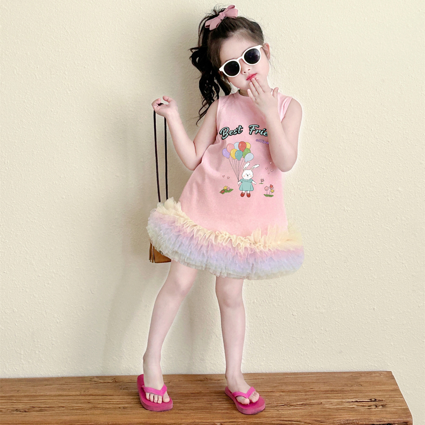 A new sweet and stylish cartoon T-shirt dress for baby girls in summer 2024, featuring colorful gauze patchwork