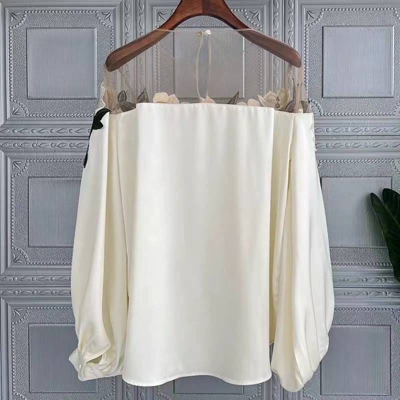 This is a fashionable long-sleeved, elegant and drape shirt with a unique lace-stitched embroidered collar for women in the autumn of 2022 Item Picture