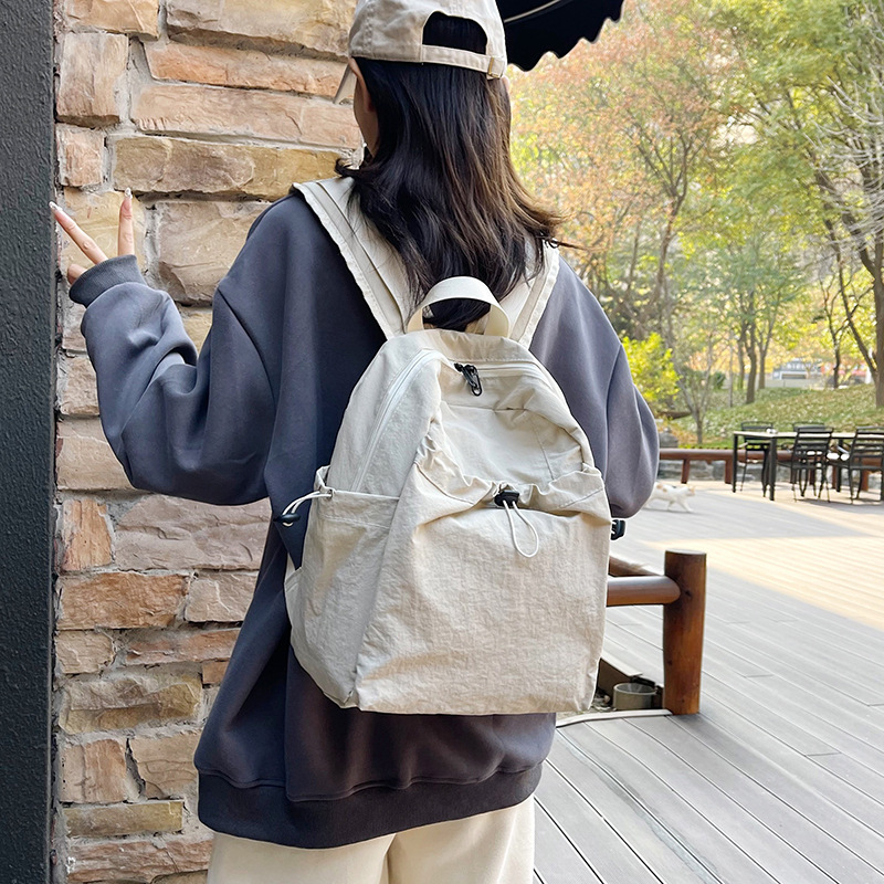 跨境日系抽绳轻便双肩背女百搭通勤上课学生书包户外运动休闲背包