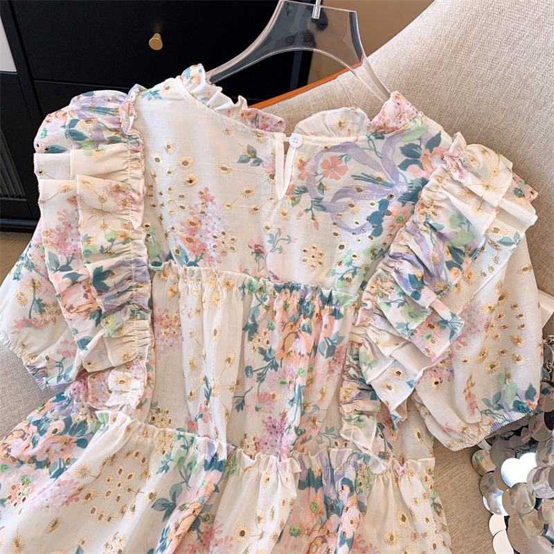 A real photo of the Korean version of the ruffled, floral and hollowed-out flying sleeve shirt for women's summer 2024 new style sweet blouse Specification image