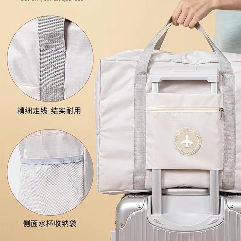 A large-capacity, waterproof, simple, lightweight, foldable short-distance luggage bag with a handle details Picture
