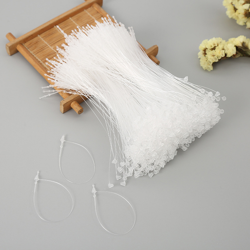 吊牌/蝴蝶结/服装吊线/吊钟穿绳扣/订做小标签产品图