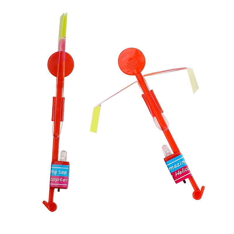 The "Glowing Little Flying Arrow" street stall is selling a lot of led flashing bamboo dragonfly ejection flying rocket children's glowing toys wholesale Item Picture