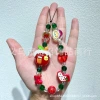 ins Christmas phone chain: Versatile beaded Christmas tree, Snow Man, Heart, green gingerbread Man, glass phone lanyard Item Picture