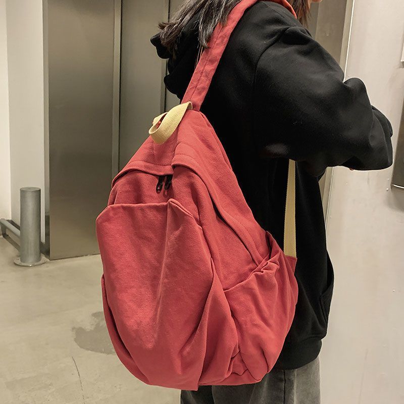 小众帆布书包女新款大容量大学生简约初中复古背包双肩包旅行原宿详情6