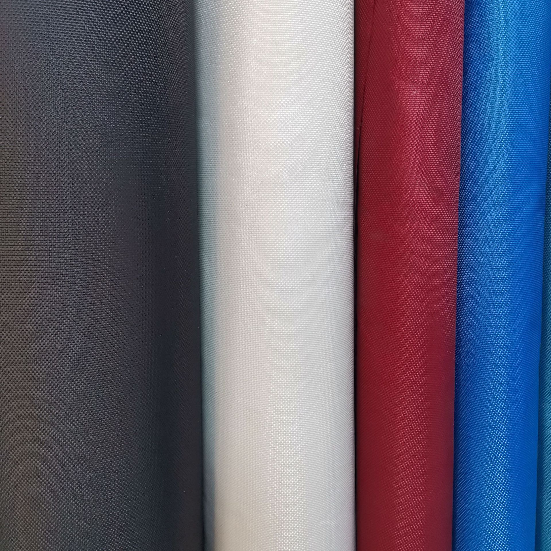 Wholesale and direct sales of 1680D double-strand PVC black polyester reinforced fabric for luggage materials