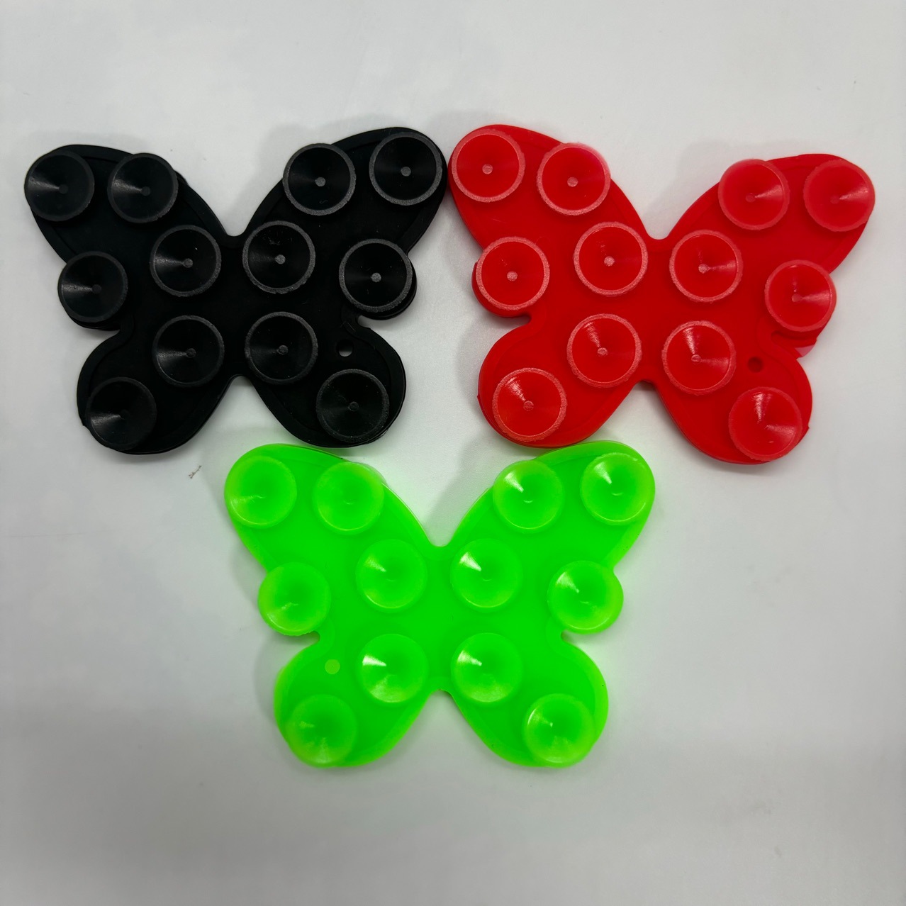 The factory sells multi-functional silicone double-sided adhesive suction cup mobile phone stick butterfly granule self-adhesive mobile phone bracket details Picture