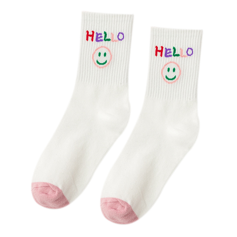 Women's mid-calf trendy brand spring and summer Japanese-style smiling black and white long calf socks, pure cotton versatile couple basketball sports socks Item Picture