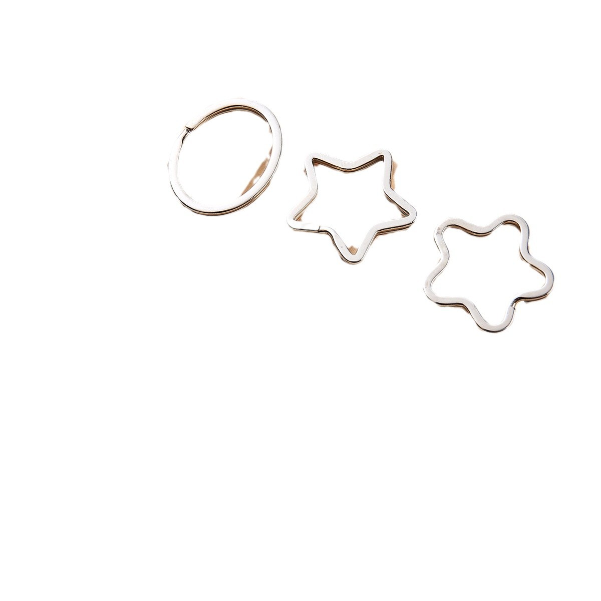 Factory direct sales of apple-shaped keychains, heart-shaped keychains, various irregular-shaped key rings, and double-layer metal decorative buckles Item Picture