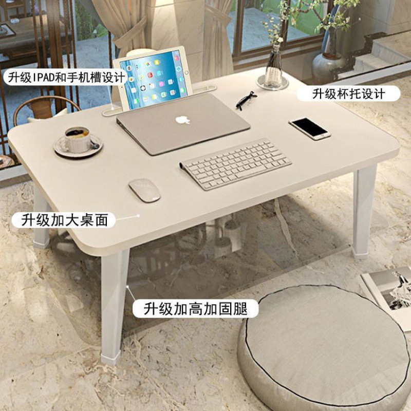 A small table on the bed, a seat in the bedroom, a foldable student dormitory table board, a desk, a cute ins carpet, a computer details Picture