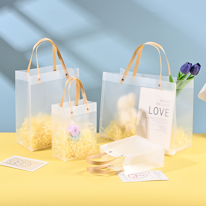 In-stock transparent tote bags, wedding gift bags, PP plastic gift bags, frosted gift bags, advertising and promotional bags details Picture