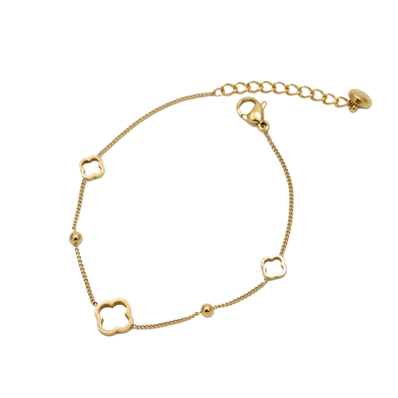 The light luxury and simple hollowed-out four-leaf clover titanium steel bracelet is a fashionable and niche design for girls. It is an exquisite new accessory that does not fade Item Picture