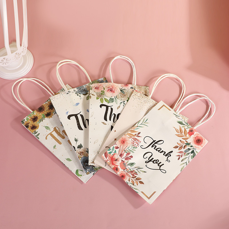 In-stock kraft paper bags, cartoon rose, clover, sunflower packaging, universal bags, paper bags for giving gifts, gift bags details Picture