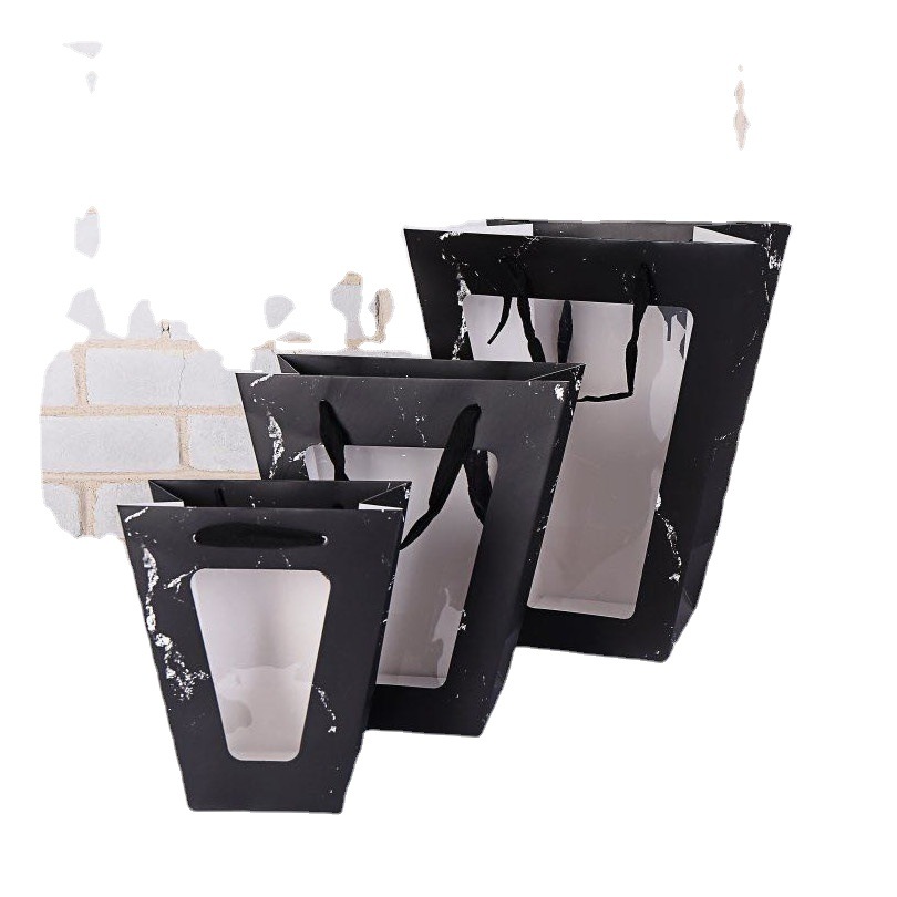 Factory direct sales of white card trapezoidal flower window bags in stock for wholesale. Festival flower hand-held gift bags and shopping bags Item Picture