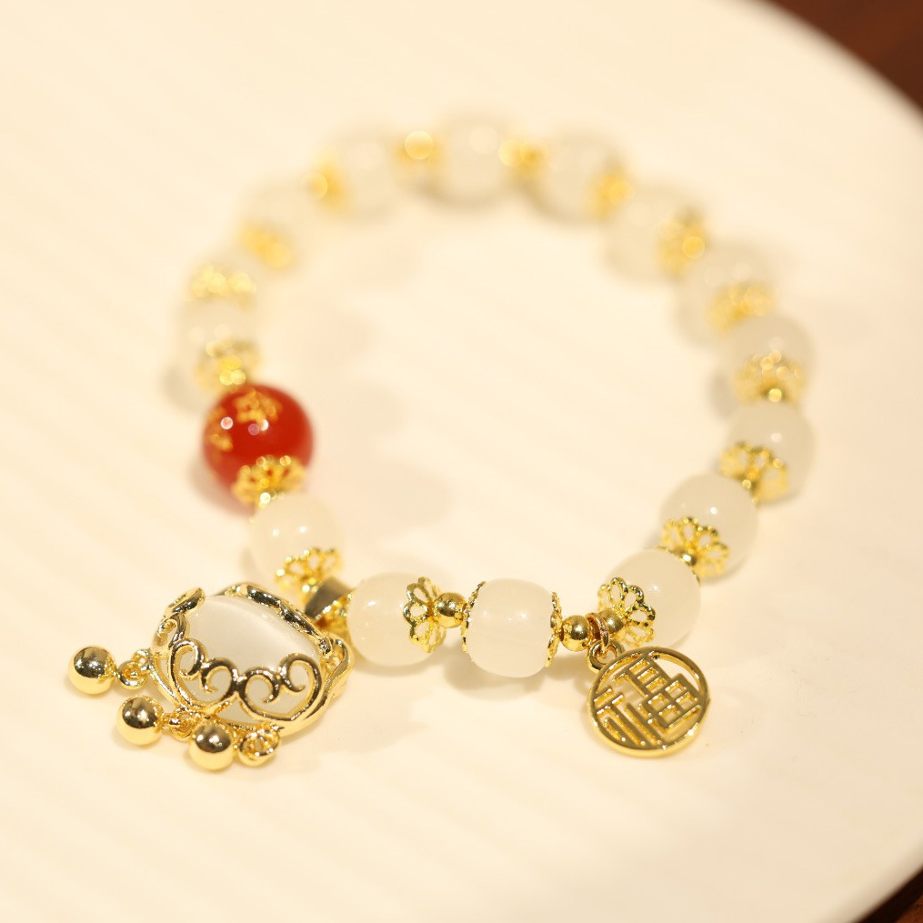 Wholesale of natural red agate cat's eye safety lock bracelets, Chinese-style delicate jewelry for women