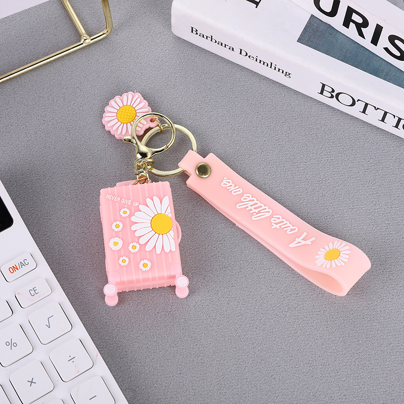 Pinjiang PVC drop Molding Creative and personalized promotional gifts, ins Daisy suitcases, keychains, fashionable pendants, bags and pendants Application Scenario