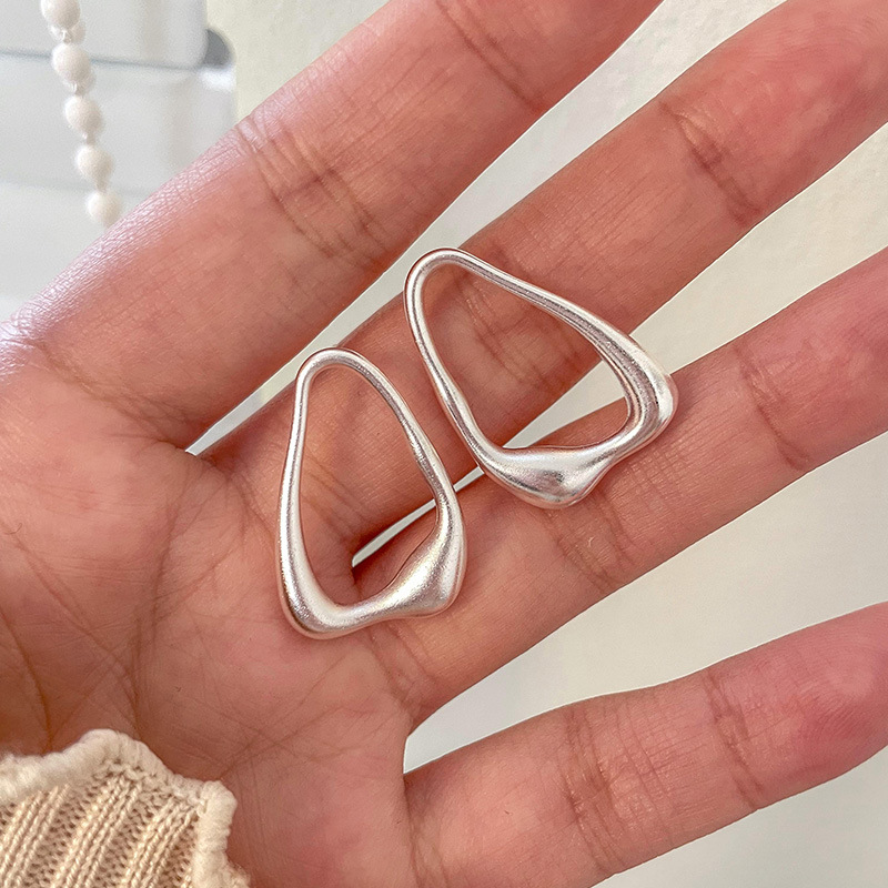 Silver needle, niche fashion, minimalist and cold style, European and American frosted lava triangular stud earrings, teardrop-shaped stud earrings 2024 trend details Picture