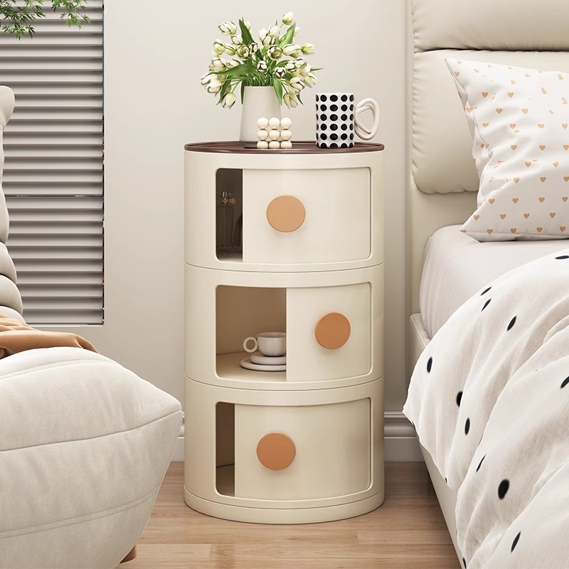 The bedside table, a small household bedroom storage rack, a simple and modern storage cabinet, a new round small side table as an alternative details Picture
