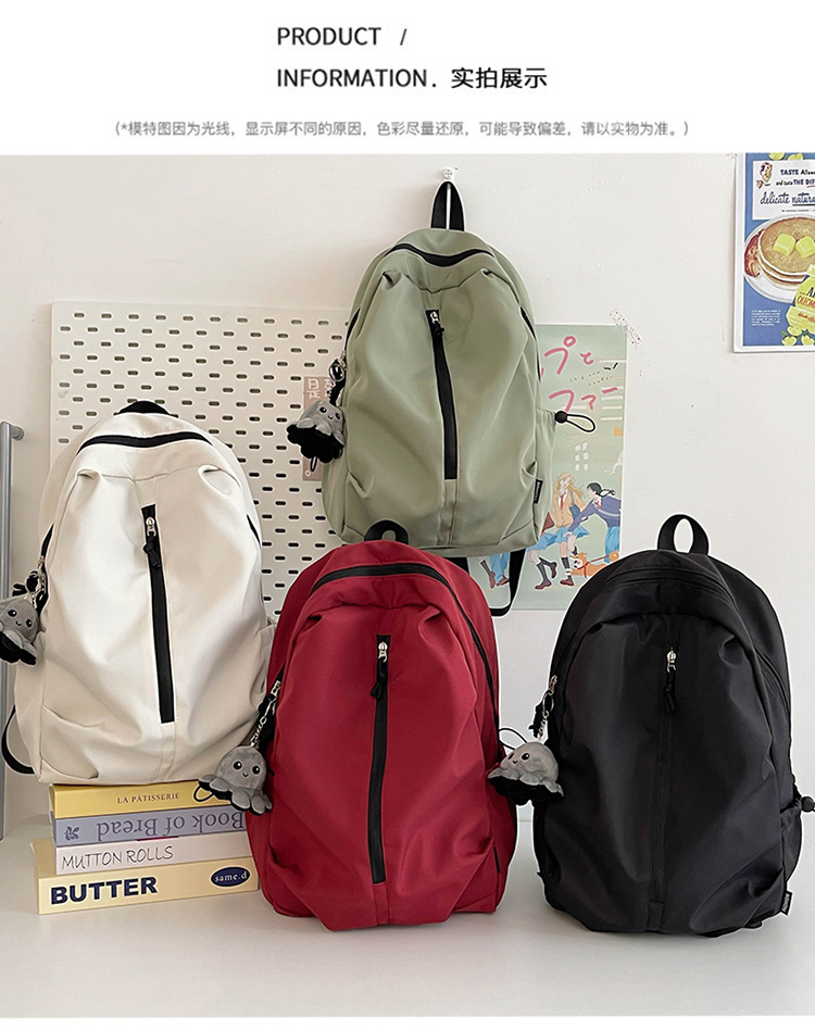 双肩包女旅游轻便户外休闲登山背包简约纯色初高中学生书包大容量详情15