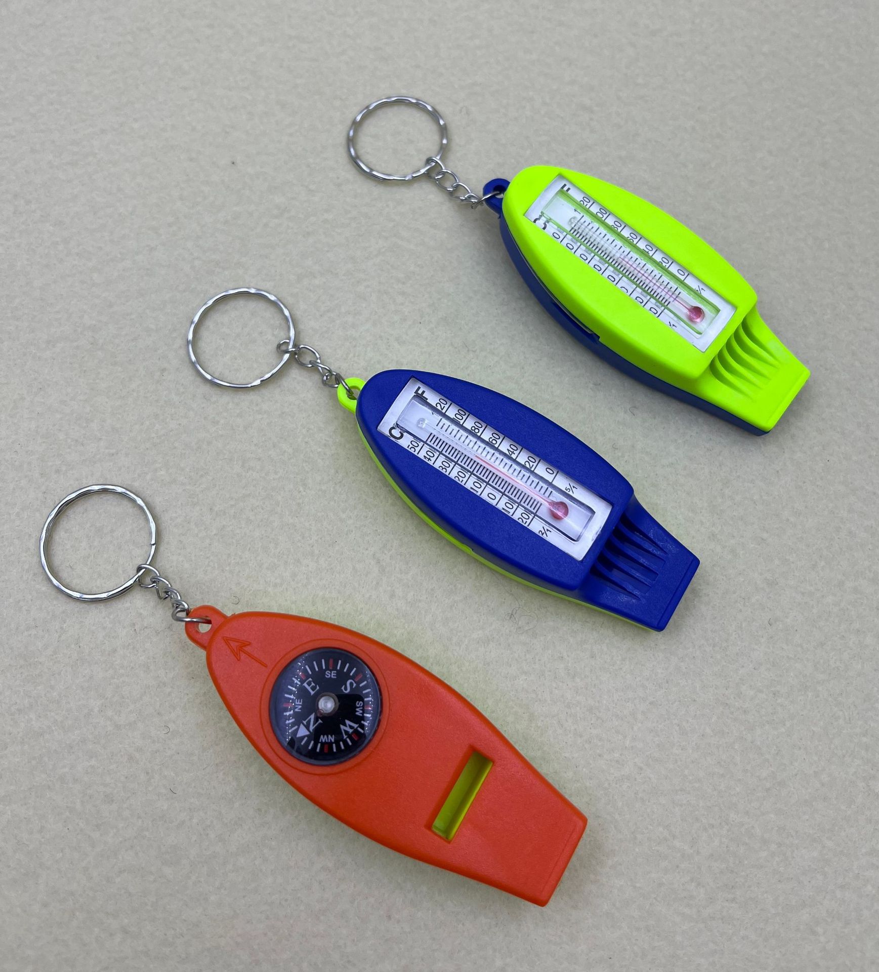 H4-1 Multi-functional whistle keychain thermometer Compass Student Gift Mountain Climbing Compass details Picture