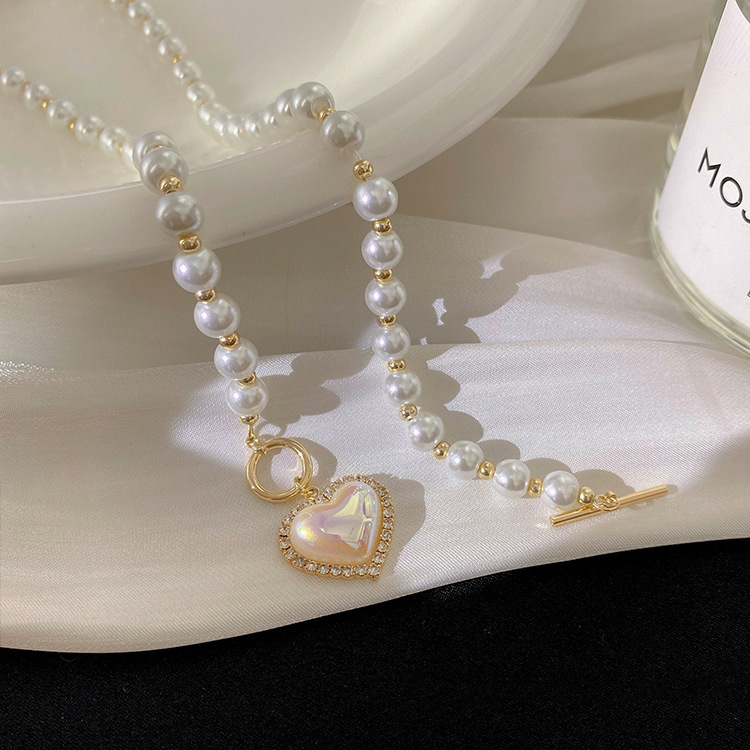 Japanese and Korean pearl heart-shaped necklace, women's real gold color retention electroplating, trendy and niche design sense, elegant collarbone chain, versatile neck chain Specification image