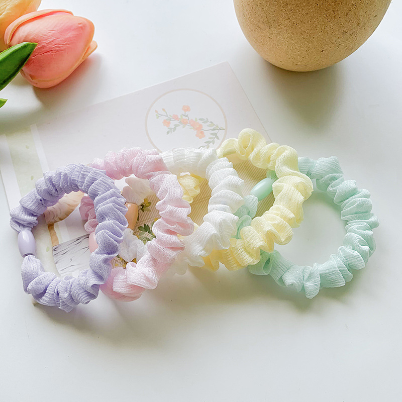 Wholesale of sweet and refreshing candy-colored small intestine hair bands, hair ties, and leather bands in Korean style Application Scenario