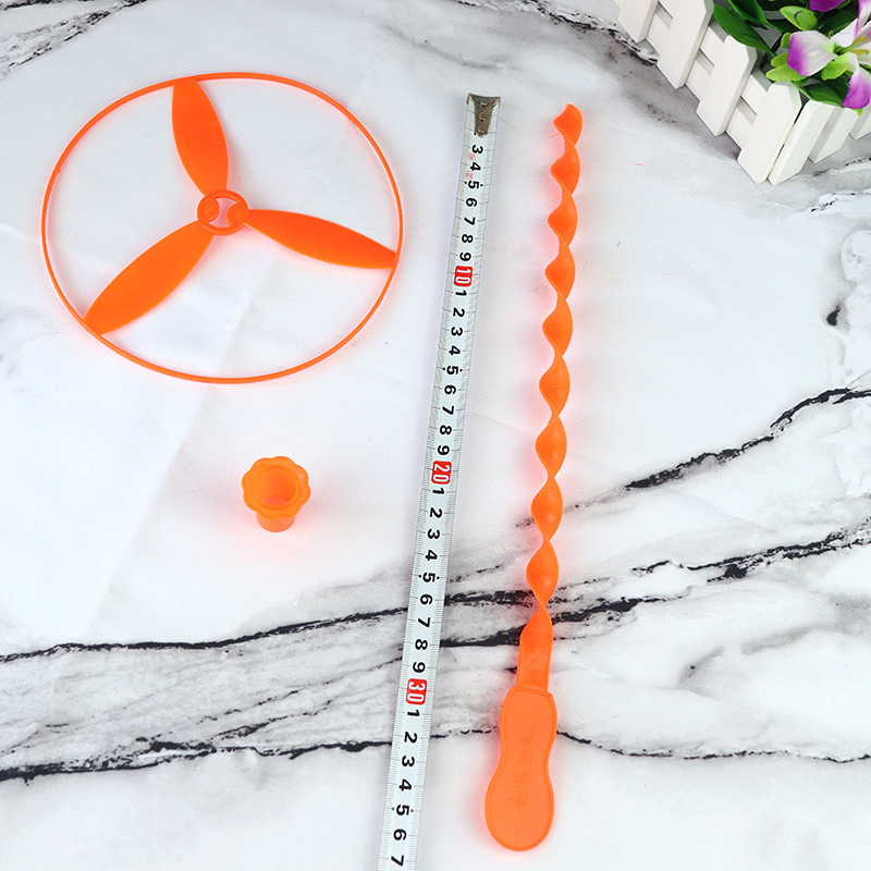 Hand-pushed flying fairy, rotating frisbee, rotating wind, plastic flying saucer, outdoor windmill, one-yuan children's toy Application Scenario