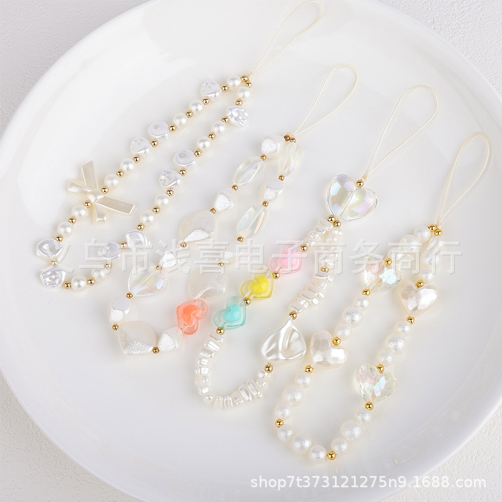 New European and American pearl bow heart-shaped mobile phone chain with beads, short mobile phone lanyard, wrist pendant, pendant and lanyard