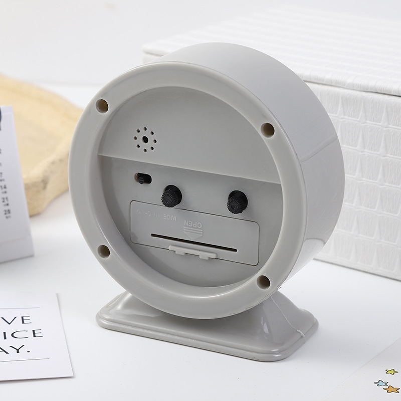 Creative circular digital simple alarm clock for children, students, bedside and home decoration, time-scanning clock Application Scenario