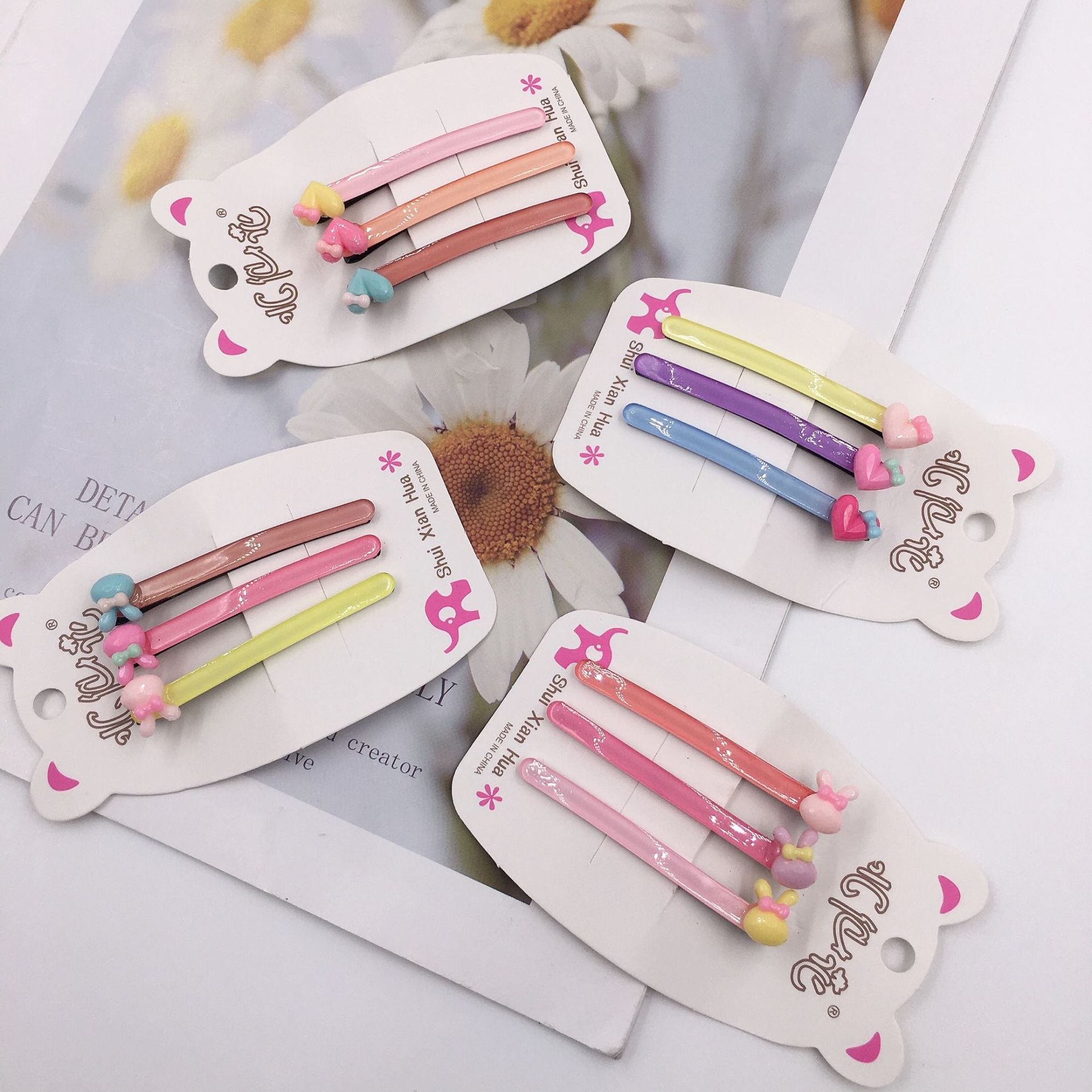 Three cute and trendy hair clips for children, including a one-line clip, a bangs clip, and a side clip Specification image