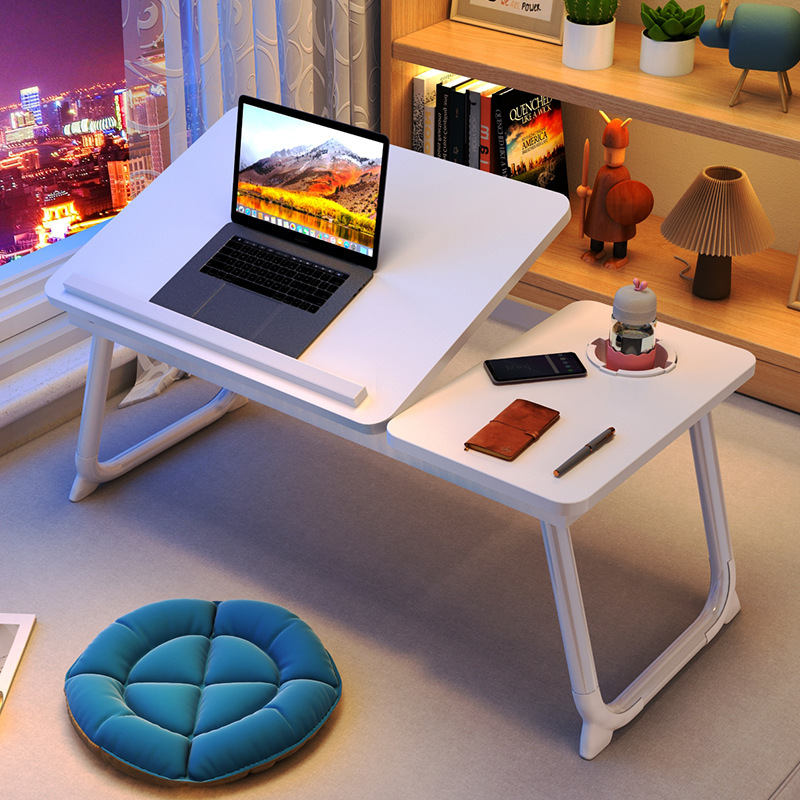 The small computer desk on the bed can be raised, lowered and folded. It is a home student writing desk for the bedroom and a lazy study desk for the dormitory details Picture