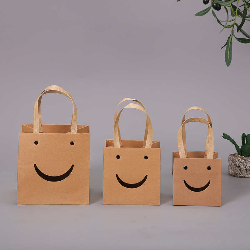 The New Kraft Paper Bag Wholesale Creative Design Smiley Face Tote Bag Go Out Jewelry Storage Convenient Packaging Box Specification drawing