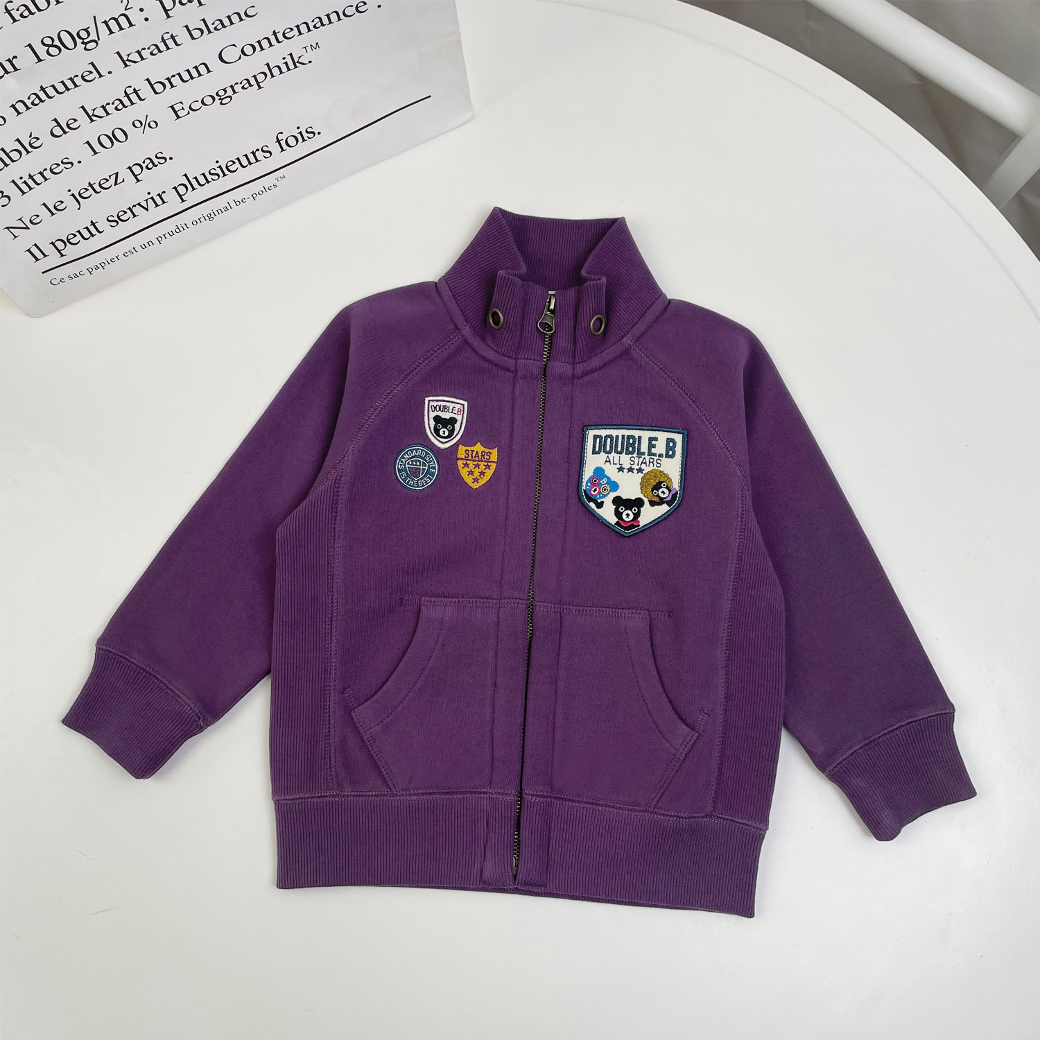 Miki's Spring 24 collection of Japanese streetwear for boys, girls and children features a DB explosion hairstyle badge, a high-neck, stylish zipper cardigan details Picture