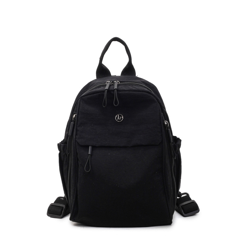 The new multi-functional solid color simple women's backpack is fashionable, lightweight and versatile. It's a small backpack for daily outdoor activities for women Item Picture