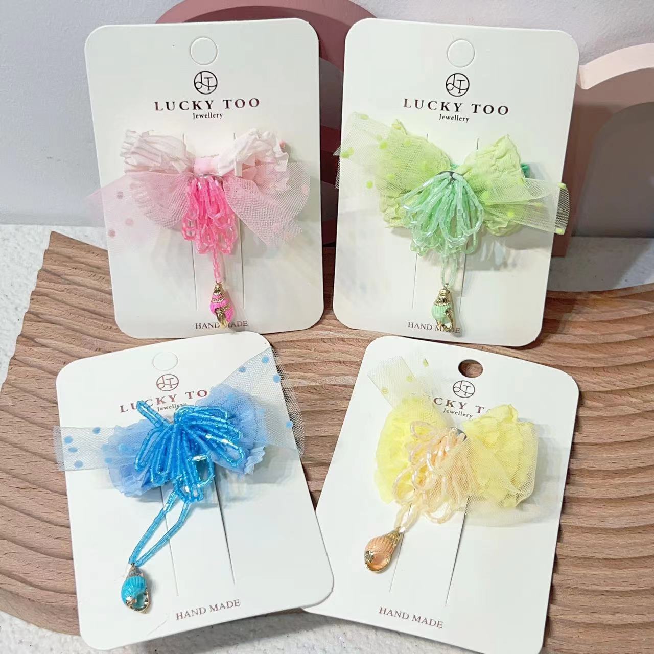 发夹LT10210韩系新款儿童手工串珠海螺莎莎蝴蝶结发饰发夹