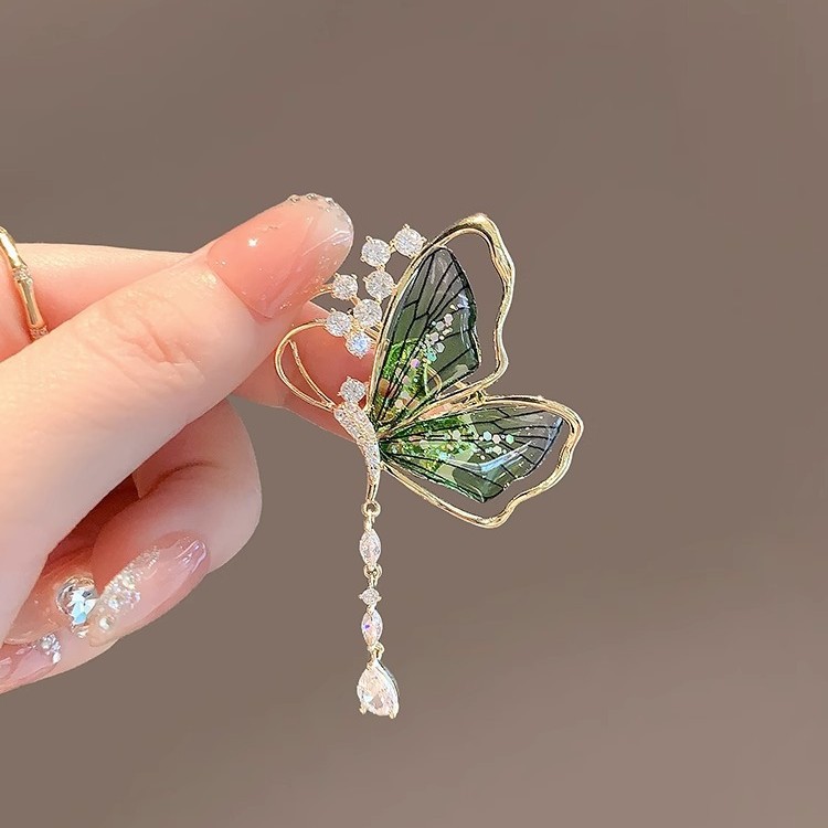 A High-End Emerald Brooch In 