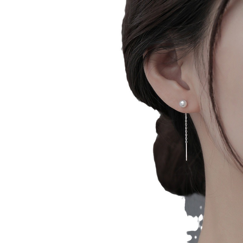 The new stylish earrings imitate the popular pearl ear lines, exuding a fashionable and elegant charm. The long tassels make the face slimmer and are versatile. The round pearl earrings are a perfect match Item Picture