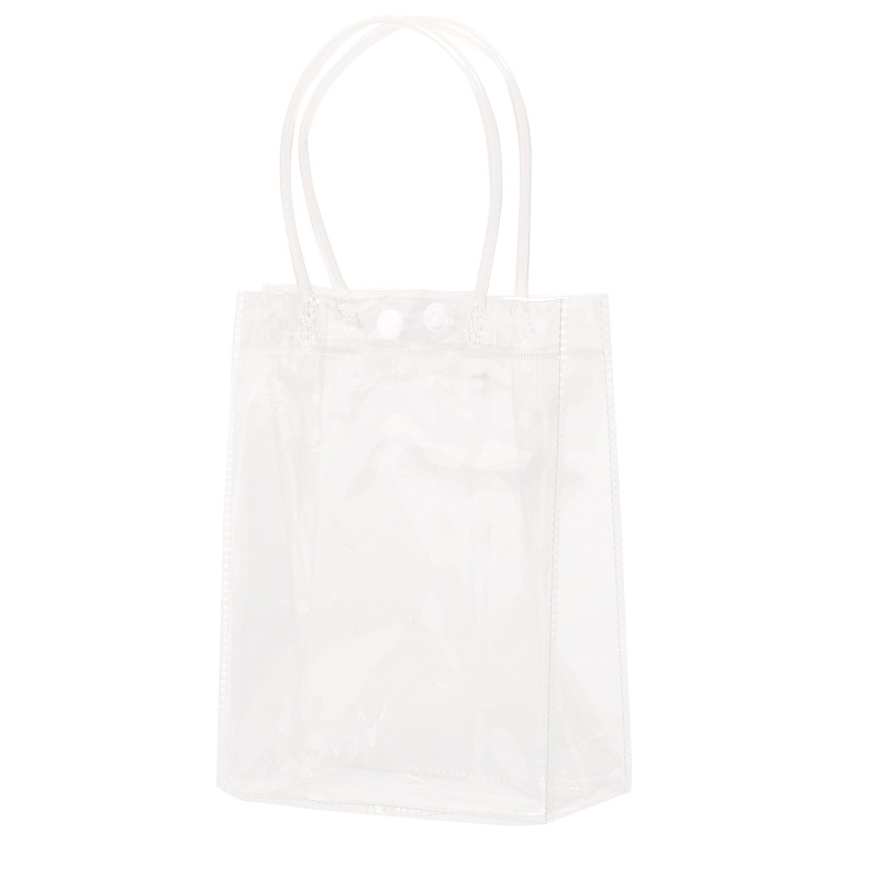 PVC透明手/塑料礼品袋伴白底实物图